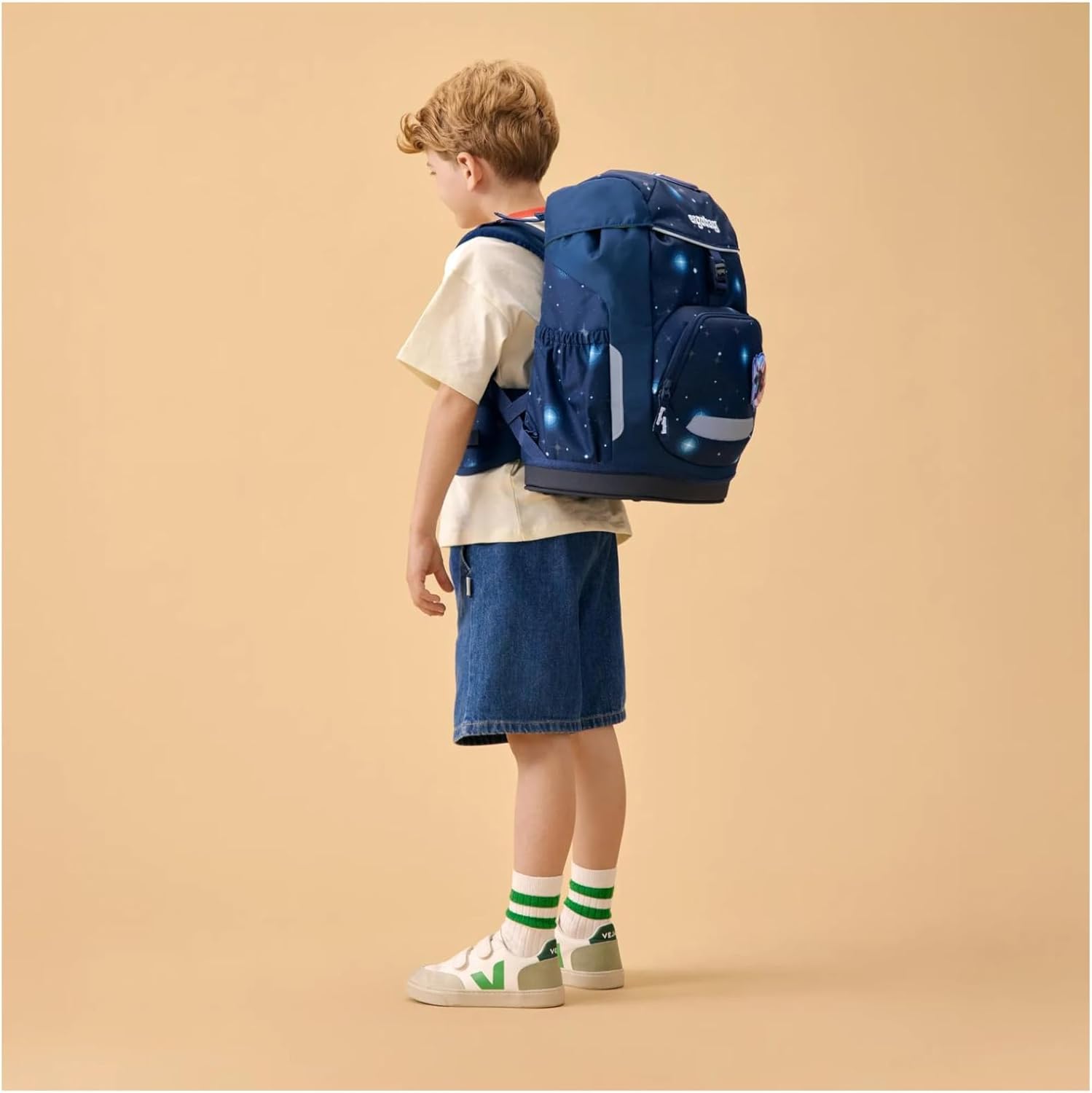 Zaino ergobag Flex AtmosBear per scuola elementare, con scomparti colorati e design resistente, ideale per bambini.