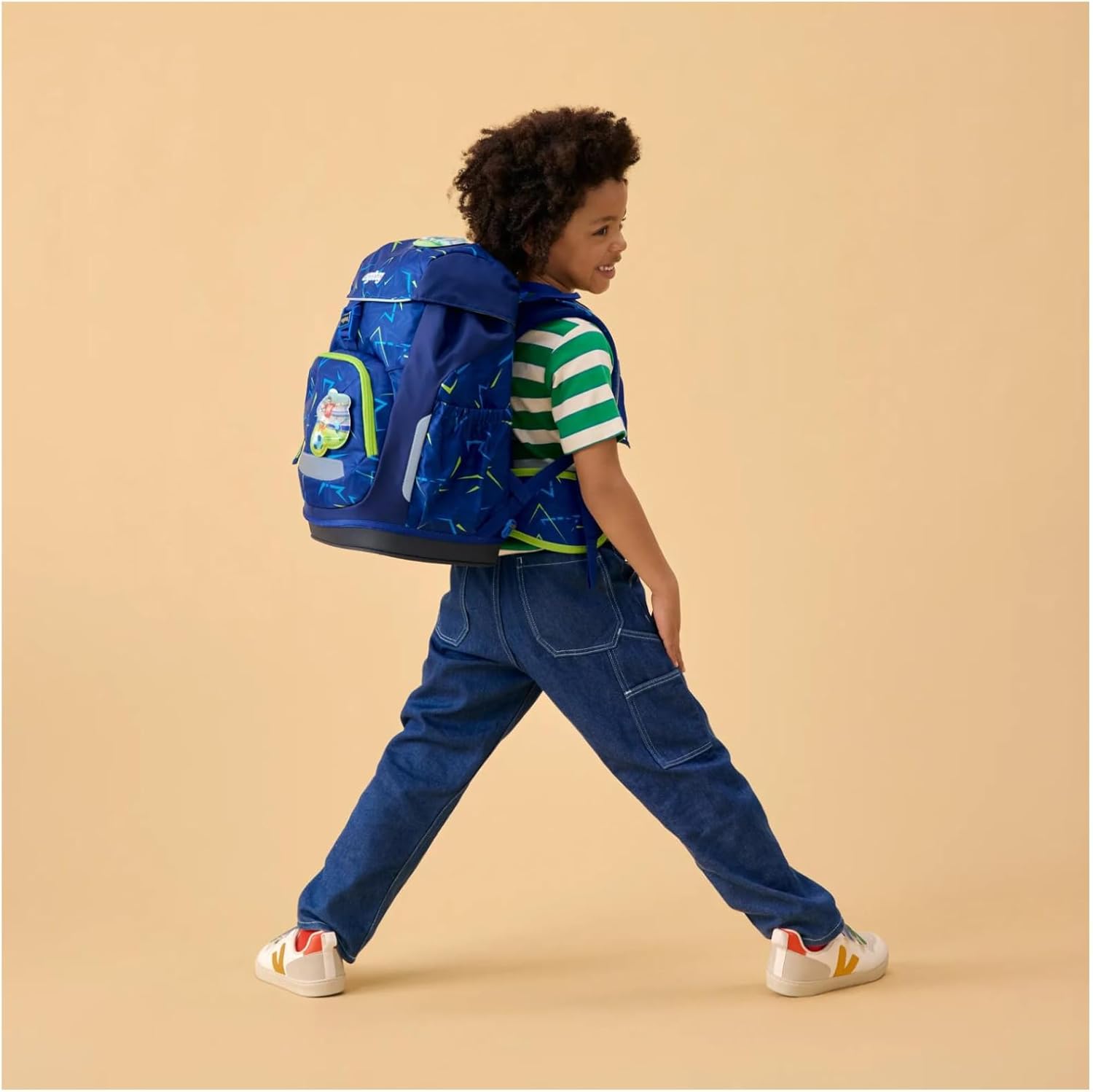 Zaino ergobag Flex per scuola elementare, modello Front Runbear, con design colorato e spazio per libri e materiali scolastici