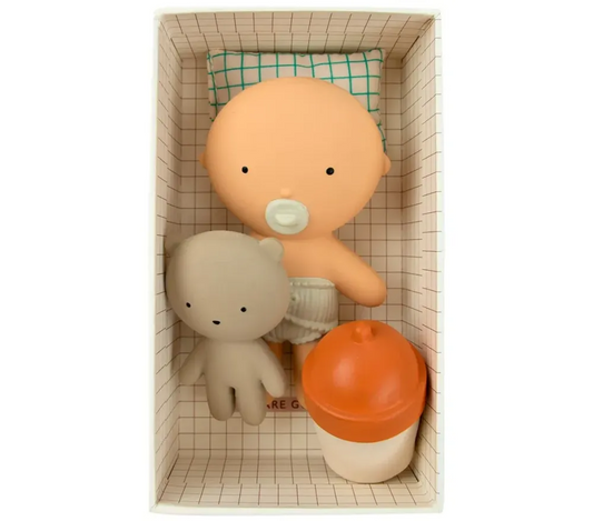 Bambola in gomma WE ARE GOMMU Pocket Baby Vanilla, piccola e morbida, 10 cm, con dettagli realistici e colori naturali.